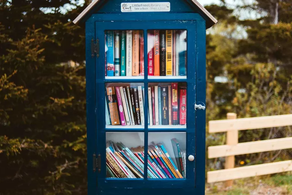 how to promote your company local showing a box of books